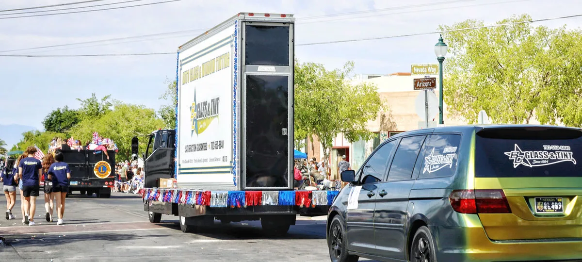 BC Glass & Tint branded box truck in the Boulder City parade